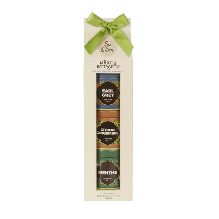 Coffret cadeau "Bio & Bon" de la Maison Bourgeon, présenté avec un ruban vert. Le coffret contient trois boîtes de thé bio : Earl Grey (thé noir), Citron Gingembre (thé vert), et Menthe (thé vert). Un élégant assortiment pour offrir une variété de saveurs classiques et rafraîchissantes, parfait pour les amateurs de thé.